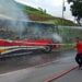 BUS TERBAKAR. Petugas pemadam kebakaran Pemkab Lampung Selatan memadamkan api yang berada di bus AKAP DAMRI yang terbakar di Jalinsum Desa Hatta, Bakauheni, Lampung Selatan, Kamis (27/12). Api diduga dari korsleting pengapian di bus tersebut.
(DOKUMENTASI DAMKAR PEMKAB LAMSEL)