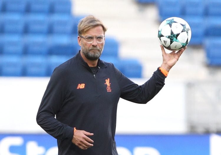 Liverpool's German coach Juergen Klopp is pictured during a training session on August 14, 2017 in Sinsheim, Germany, on the eve of the Football Champions League qualifier match TSG 1899 Hoffenheim vs Liverpool FC. / AFP PHOTO / Daniel ROLAND