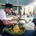 TAHUN BARU ISLAM. Kenduri menjadi salah satu agenda suroan yang digelar masyarakat Pekon Banyumas, Pringsewu, Kamis (26/9). (LAMPUNG POST/WIDODO)