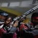 EMAS MENEMBAK. Atlet menembak Indonesia Vidya Rafika Rahmatan Toyyiba (tengah) dan Fathur Gustafian mengikuti kualifikasi 10 meter air rifle mixed team SEA Games 2019 di Philippine Marine Shooting Range Total, Manila, Filipina, Kamis (5/12) lalu. Fathur dan Vidya berhasil meraih medali emas dengan skor total 17 mengalahkan Thailand yang hanya mendapatkan skor total 7 dalam partai final.(ANTARA FOTO/SIGID KURNIAWAN)