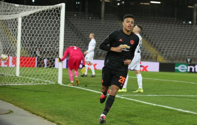 MENANG TELAK. Pemain Manchester United Mason Greenwood usai mencetak gol ke gawang Lask Linz pada leg pertama 16 besar Liga Europa, Jumat (13/3) dini hari WIB. Manchester United menang telak pada laga ini dengan skor 5-0.(TWITTER/UEFA EUROPA LEAGUE)