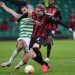 AC MILAN KALAHKAN CELTIC 3-1. Gelandang AC Milan Jens Petter Hauge (kanan) bersaing dengan bek Celtic Jack Hendry dan berhasil mencetak gol ketiga timnya saat pertandingan sepak bola grup H babak pertama Liga Eropa UEFA antara Celtic dan AC Milan di Stadion Celtic Park di Glasgow, Jumat (23/10). AC Milan mencatatkan delapan kemenangan beruntun pada awal musim ini. Korban terbaru Milan adalah Celtic yang dikalahkan dengan skor 3-1 di laga perdana Liga Europa.
AFP/RUSSELL CHEYNE