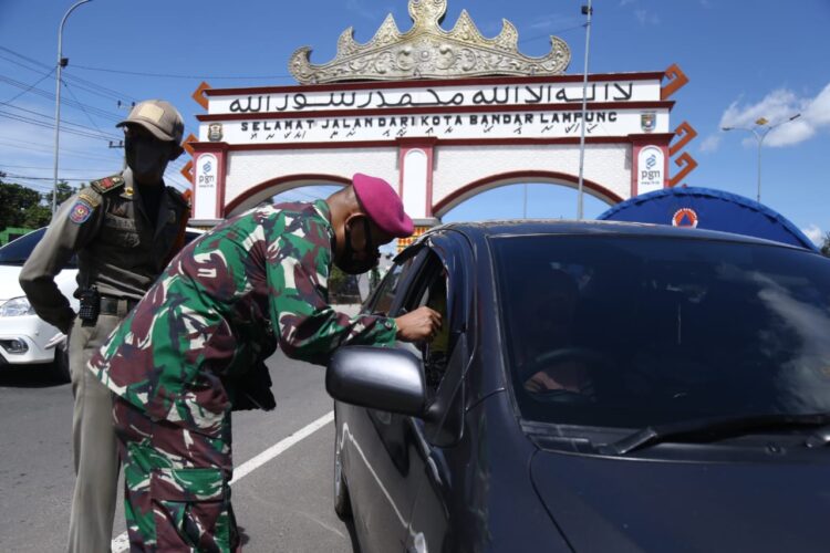 Perketat protokol kesehatan selama liburan. (LAMPUNG POST/SUKISNO)