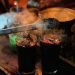 Kopi joss yang mantaf di angkringan kawasan Kedatob. (LAMPUNG POST/APRIESTI L)