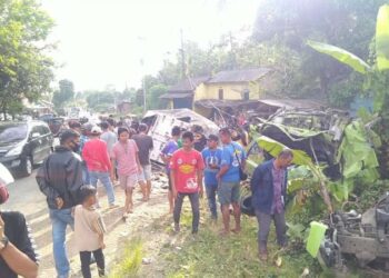 Kecelakaan yang melibatkan dua kendaraan menewaskan dua orang terjadi di Jalan Lintas Sumatera (Jalinsum) KM 24-25, Dusun Sukabanjar, Desa Tarahan, Kecamatan Katibung, Lampung Selatan, Minggu 10 Januari 2020. Lampung Post/Perdhana Wibisono