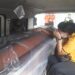 Jenazah korban tragedi jatuhnya Pesawat Sriwijaya Air SJ182, Sugiono Efendi dan Yohanes asal Tiyuh Totomakmur, Kecamatan Batuputih, Kabupaten Tulangbawang Barat, tiba di Bandara Radin Inten II. (Lampost.co/Andi Apriadi)