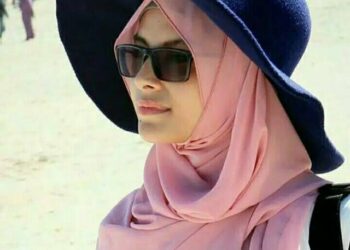 Topi apik dan gaya buat di pantai. (DOK)