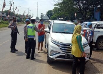 Ratusan Kendaraan Masuk Palembang Diminta Putar Balik