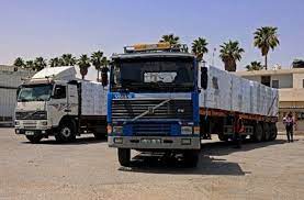 Truk-truk bantuan kemanusiaan mulai masuk ke Jalur Gaza pada Jumat, 21 Mei 2021. (SAID KHATIB / AFP)