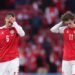 Ekspresi kekecewaan pemain Denmark setelah kalah dari Finlandia. (Friedemann Vogel / POOL / AFP)