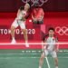 Indonesia's Marcus Fernaldi Gideon (L) hits a shot next to Indonesia's Kevin Sanjaya Sukamuljo in their men's doubles badminton group stage match against India's Chirag Shetty and India's Satwiksairaj Rankireddy against during the Tokyo 2020 Olympic Games at the Musashino Forest Sports Plaza in Tokyo on July 26, 2021. (Photo by Alexander NEMENOV / AFP)