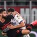 AC MILAN KALAHKAN VERONA 3-0. Penyerang AC Milan Olivier Giroud (kiri) dan bek Hellas Verona Koray Gunter berebut bola saat pertandingan sepak bola Serie A Italia antara AC Milan dan Hellas Verona di Stadion San Siro Milan, Minggu (17/10). AC Milan menang secara dramatis 3-2 dari Hellas Verona pada pekan kedelapan Liga Italia.
AFP/MARCO BERTORELLO