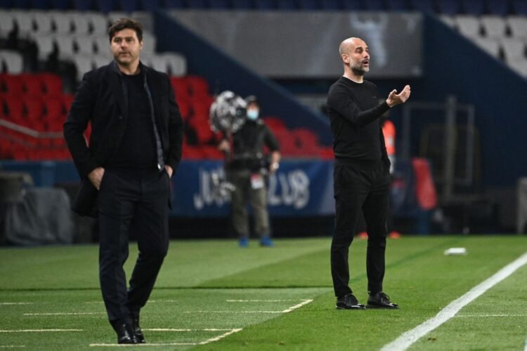 DUA PELATIH
Pelatih Manchester City Pep Guardiola (kanan) bersama Pelatih PSG Mauricio Pochettino.AFP/POUJOULAT  