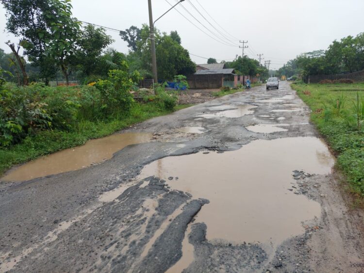 perbaikan jalan bandarjaya