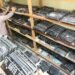 Petugas kepolisian menata pelat Tanda Nomor Kendaraan Bermotor (TNKB) di gudang Samsat Aceh Barat, Aceh.  ANTARA/Syifa Yulinnas