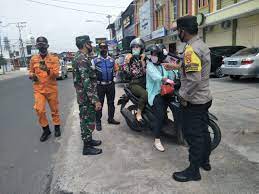 Ilustrasi penerapan protokol kesehatan. (LAMPOST.CO)