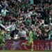 LA LIGA. Penyerang Real Betis Borja Iglesias (kanan) melakukan selebrasi usai mencetak gol ke gawnag Athletic Bilbao pada laga La Liga, Minggu (13/3) malam. AFP/CRISTINA QUICLER