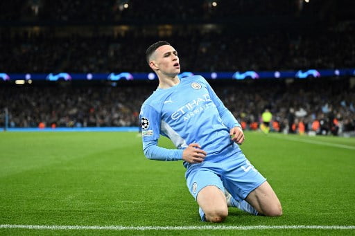 PEMAIN TERBAIK. Gelandang serang Manchester City, Phil Foden, dinobatkan sebagai Pemain Muda Terbaik Liga Primer Inggris 2021/2022.
AFP/ OLI SCARFF