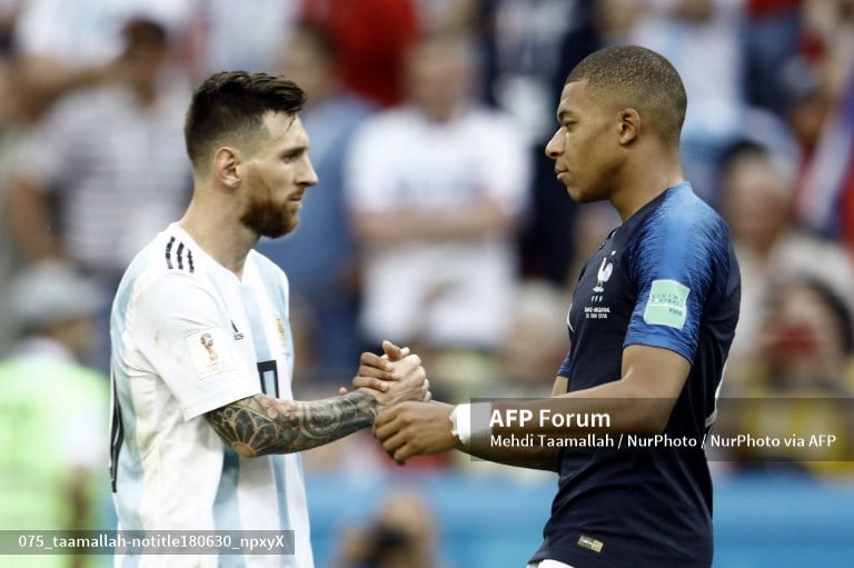 Lionel Messi akan menghadapi Kylian Mbappe di final Piala Dunia 2022AFP/Mehdi Taamallah