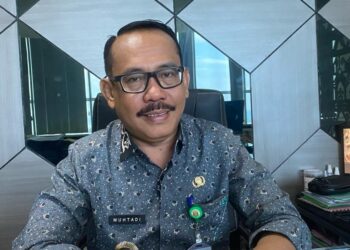 Kepala Dinas Penanaman Modal dan Pelayanan Terpadu Satu Pintu (DPMPTSP) Bandar Lampung, Muhtadi Temenggung Arsyad. (Lampung Post/Andre Prasetyo Nugroho)