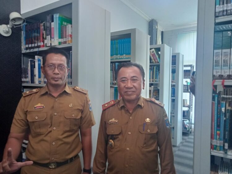 Kepala Dinas Perpustakaan dan Arsip Daerah (Dispusarda) Kota Metro, Komaruddin