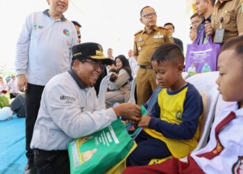 PIN POLIO. Pencanangan PIN Polio di Desa Bumi Sari, Lampung Selatan, Selasa (23/7). Pj Gubernur Lampung, Samsudin mengatakan pencanangan PIN Polio ini menyasar sebanyak 1.259.539 anak di Lampung yang berada pada rentang usia 0–7 tahun. (Dok. Adpim)