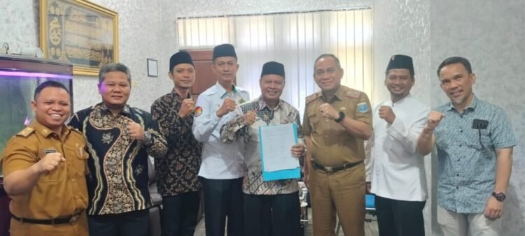 ketua baznas kota metro Joko Suroso