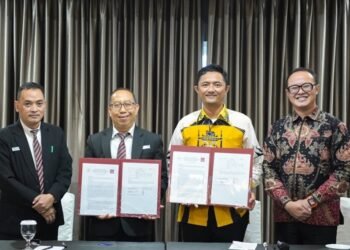 Penandatanganan MoU oleh Wakil Rektor Bidang Kerja Sama dan Umum Dr Sampurna Dadi R, S.Kom,. M.Eng bersama Manajer Emersia Hotel & Resort, Sutisna.