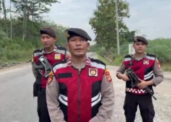 Anggota Polres Way Kanan saat melakukan patroli di wilayah jalan lintas tengah Sumatra, Kabupaten Way Kanan. Dok/Polres Way Kanan
