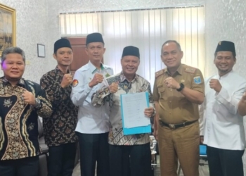 ketua baznas kota metro Joko Suroso