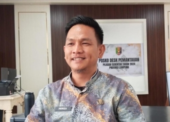 Koordinator Posko Desk Pemantauan Pilkada Pemprov Lampung, Heriza. (Foto: Lampost.co/Atika)