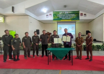 Penandatanganan MoU MGBK, Unjani, dan guru BK se-Bandar Lampung dI SMAN 9 Bandar Lampung. (Foto: Lampost.co / Umar Robbani)