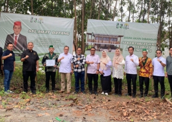 Peletakan batu pertama di lokasi Sekretariat Permanen HMI HU yang terletak di Kelurahanan Langkapura, Kecamatan Kemiling, Bandar Lampung. Lampost.co/Asrul