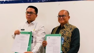 Dokumentasi foto saat penandatanganan perjanjian antara pemda dan BNI. (Lampost/Salda Andala)