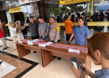 Pelaku pencabulan anak dibawah umur saat berada di Mapolresta Bandar Lampung. Dok