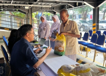 Penyaluran beras SPHP. IST