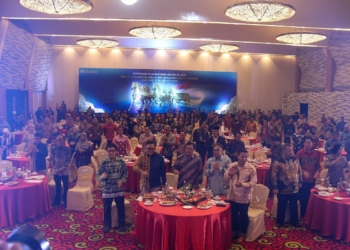 Pertemuan Tahunan Bank Indonesia (PTBI) 2025 dengan tema “Tangguh Mandiri: Sinergi Mendorong Pertumbuhan Ekonomi Lebih Tinggi dan Berdaya Tahan”. Acara berlangsung di Ballroom Hotel Novotel Lampung pada Jumat, 28 November 2025, dan terhubung secara daring dengan agenda serupa di Kantor Pusat BI, Jakarta. Rifki/Lampost.co