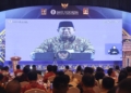 Pertemuan Tahunan Bank Indonesia (PTBI) 2025 dengan tema “Tangguh Mandiri: Sinergi Mendorong Pertumbuhan Ekonomi Lebih Tinggi dan Berdaya Tahan”. Acara berlangsung di Ballroom Hotel Novotel Lampung pada Jumat, 28 November 2025, dan terhubung secara daring dengan agenda serupa di Kantor Pusat BI, Jakarta. Rifki/Lampost.co