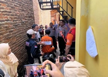 Proses rekonstruksi di indekos Kampung Baru, Kelurahan Labuhan Ratu, Kecamatan Kedaton. Dok. Lampost.co