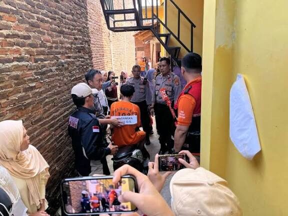 Proses rekonstruksi di indekos Kampung Baru, Kelurahan Labuhan Ratu, Kecamatan Kedaton. Dok. Lampost.co