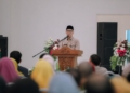Gubernur Mirza saat memberikan sambutan dalam Ujian Promosi Doktor Asisten Pemerintahan dan Kesejahteraan Rakyat Muhammad Firsada. Kegiatan berlangsung pada Ballroom UIN Raden Intan Lampung, Kamis, 12 Februari 2026. Dok ADPIM Lampung.