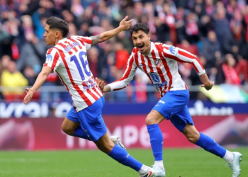 Selebrasi Nahuel Molina (kiri)