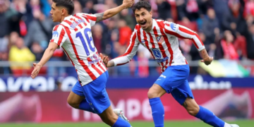 Selebrasi Nahuel Molina (kiri)