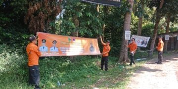 BPBD Tanggamus pasang banner himbauan di sejumlah titik rawan bencan. (dok BPBD)