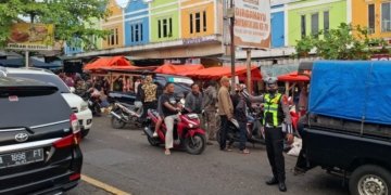 Pantauan arus lalin pagi di Pasar Gisting, Tanggamus ramai lancar tanpa hambatan. (dok Polres)