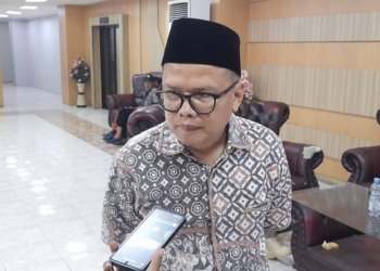 Anggota Komisi II DPRD Provinsi Lampung, Fauzi Heri saat menyampaikan keterangan. (Foto: Lampost.co / Triyadi Isworo)